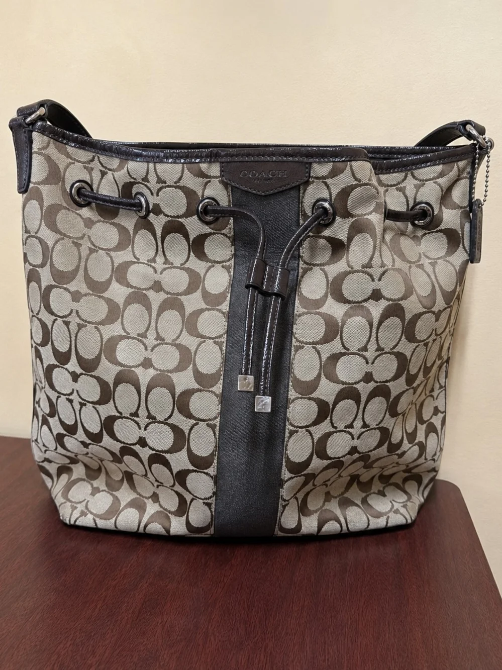 Coach Signature Canvas Drawstring Shoulder Bag in Brown and Cream